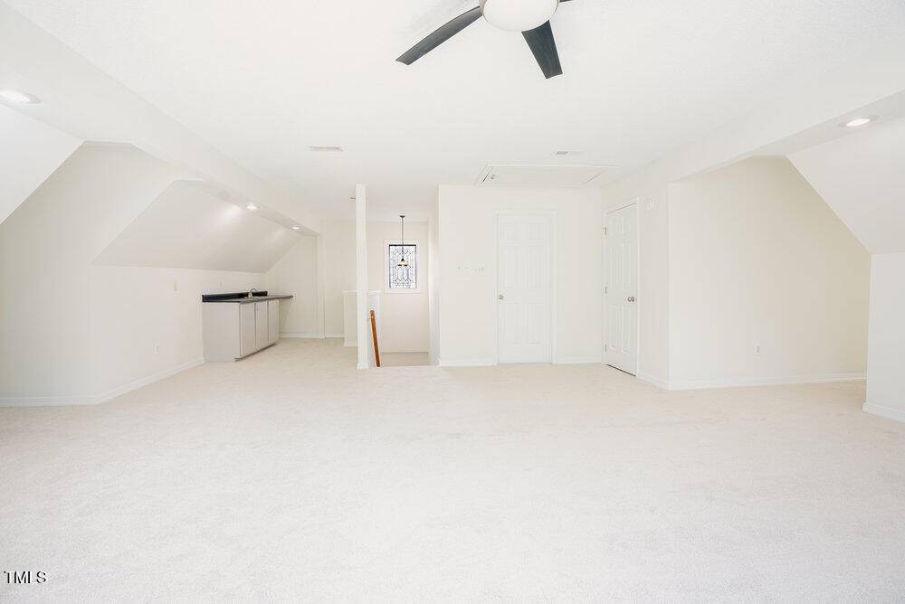 1514 Wiljohn Road Garner, NC 27529 - Photo 29 of 46 an empty room with a ceiling fan and window