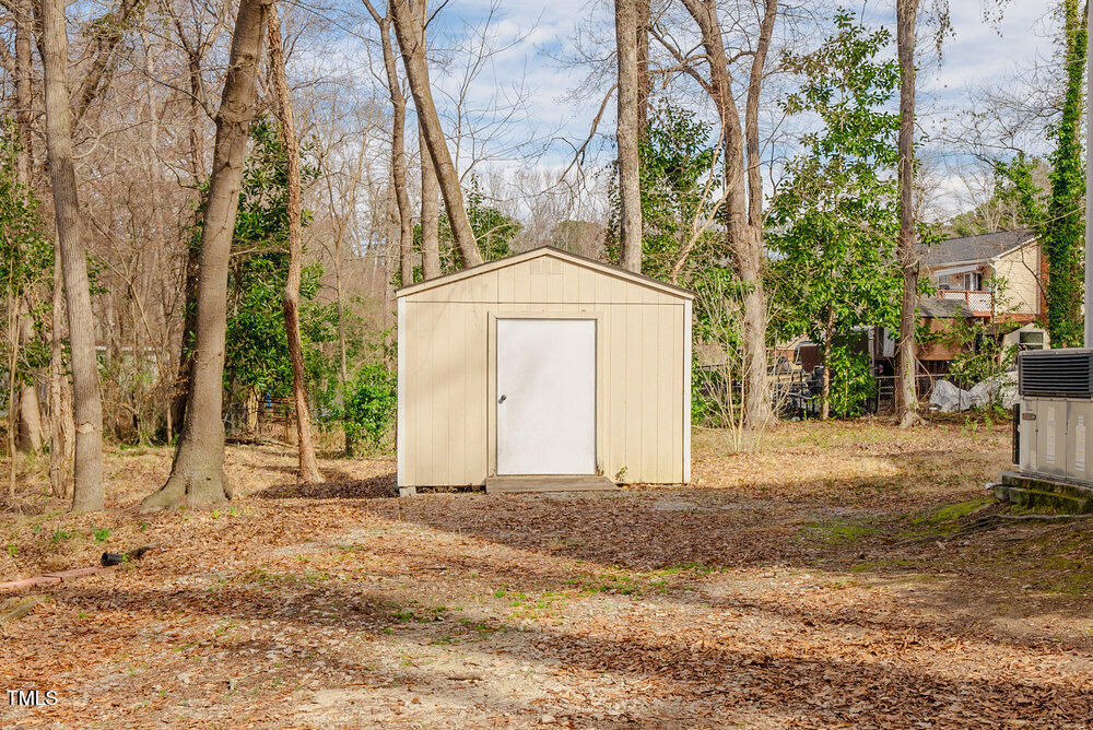 1514 Wiljohn Road Garner, NC 27529 - Photo 45 of 46 a front view of a house with a yard
