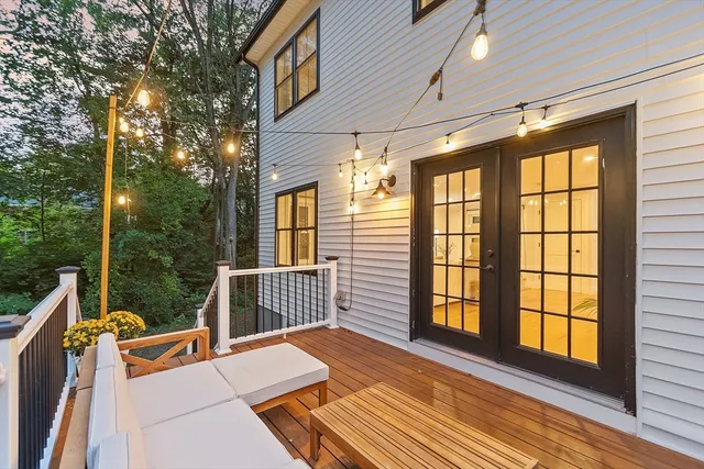 a balcony view with a seating space