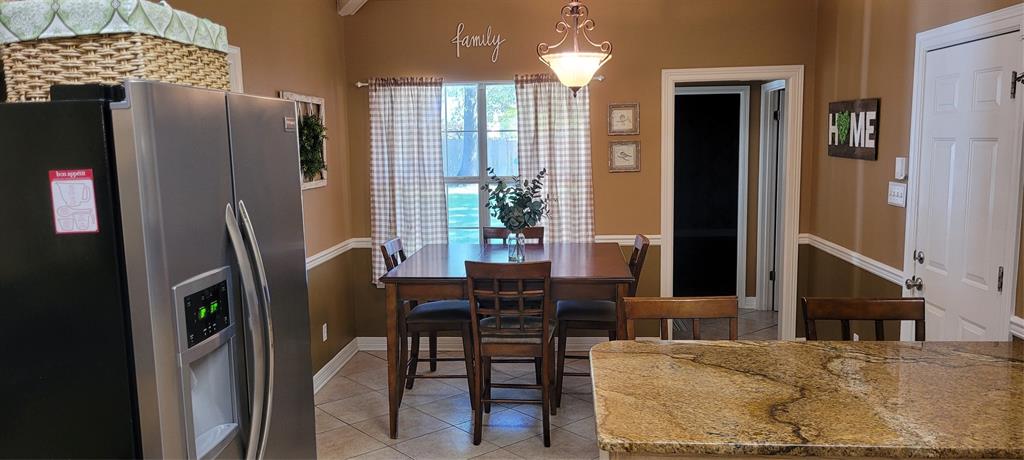 9834 East Chase Circle Shreveport, LA 71118 - Photo 12 of 23 a view of a dining room with furniture window and outside view