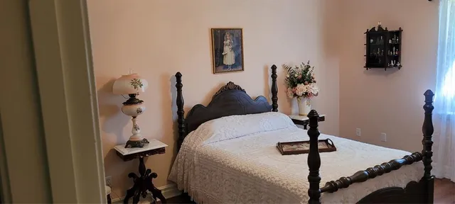 a living room with a bed