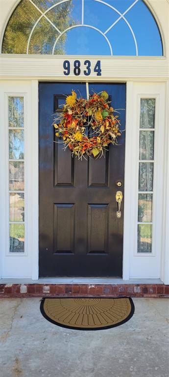 9834 East Chase Circle Shreveport, LA 71118 - Photo 2 of 23 a view of a balcony with a potted plant