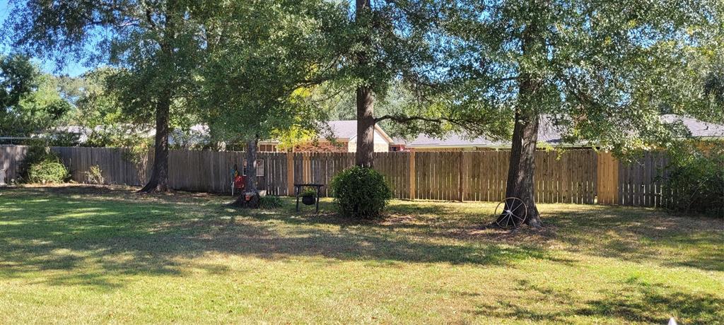 9834 East Chase Circle Shreveport, LA 71118 - Photo 22 of 23 a view of a backyard with tree s