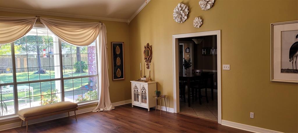 9834 East Chase Circle Shreveport, LA 71118 - Photo 8 of 23 a room with window and wooden floor