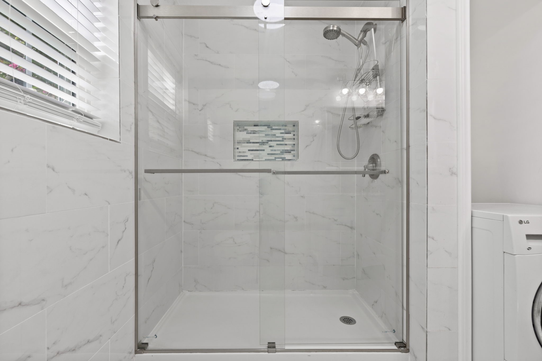 7900 Westheimer Road, Unit 121 Houston, TX 77063 - Photo 22 of 23 a bathroom with a shower