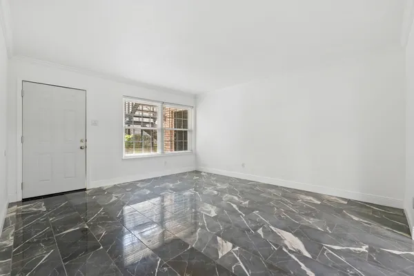an empty room with windows