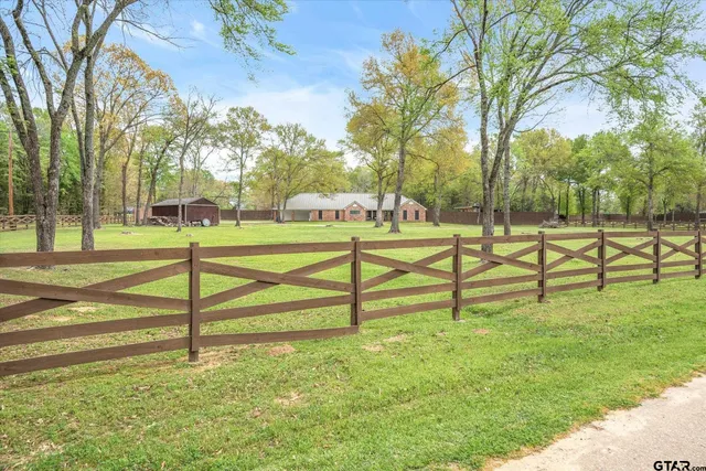 a view of a bench in a park