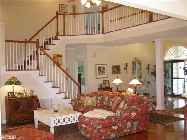 602 Stafford Pointe Court Oak Ridge, NC 27310 - Photo 16 of 16 Den/Family/Great Room. Open floor plan with majestic stairs and balcony overlooking greatroom