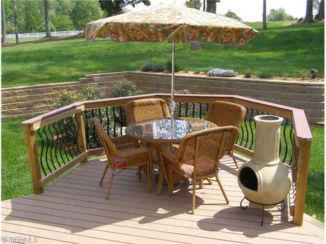 602 Stafford Pointe Court Oak Ridge, NC 27310 - Photo 13 of 16 Patio/Deck. Custom Trex Decking