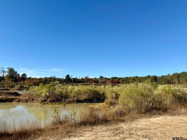 a view of mountain with lake view