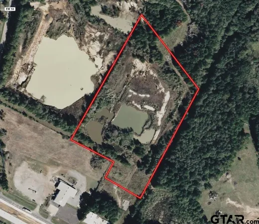 a view of a lake with a house