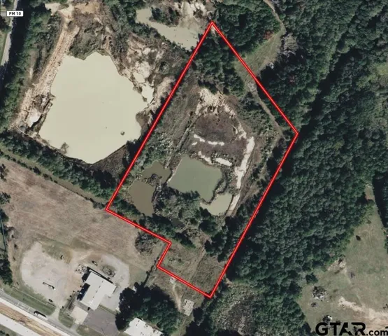 a view of a lake with a house