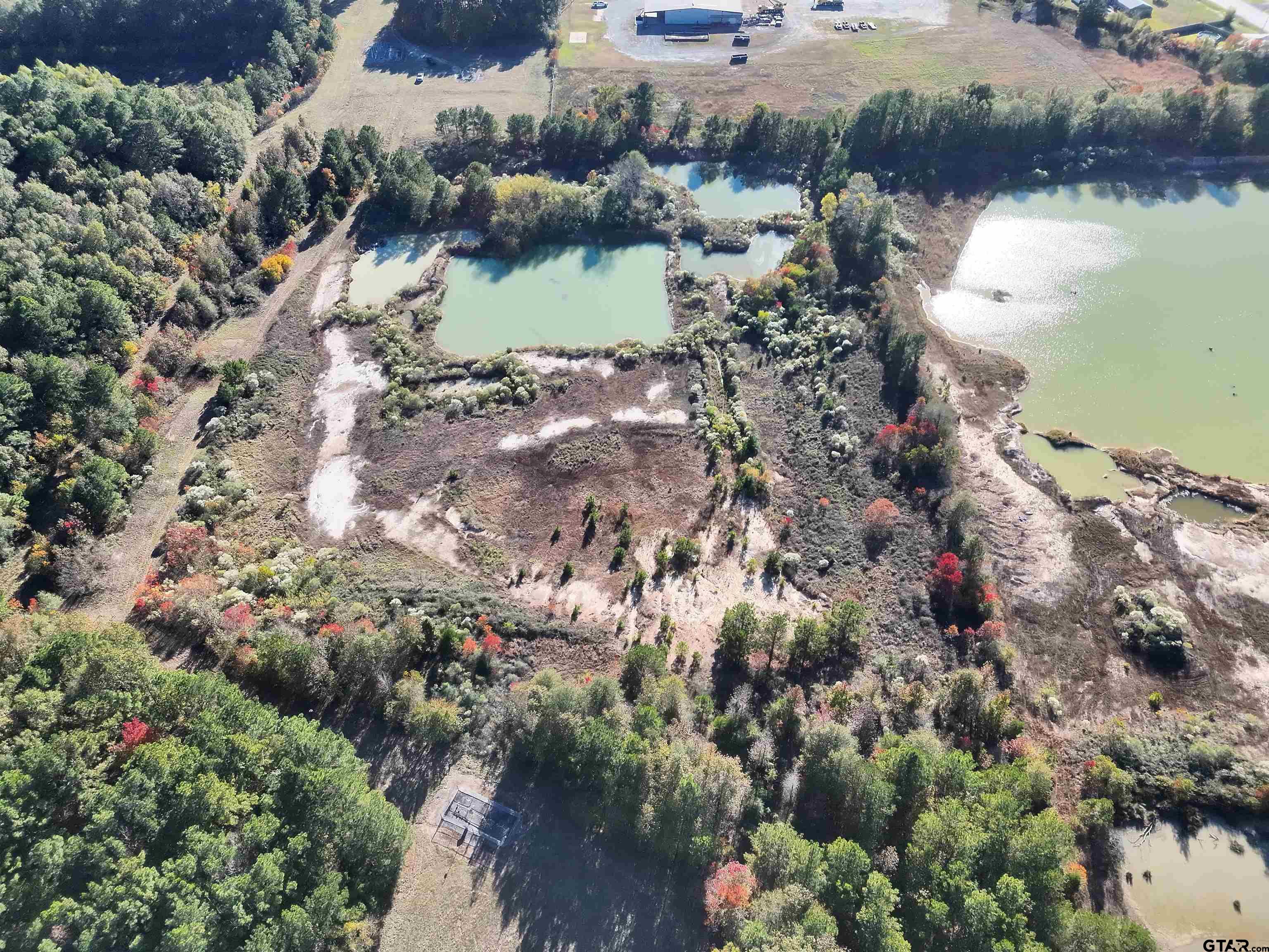 0 SW Loop Carthage, TX 75633 - Photo 4 of 18 a view of a lake with a house