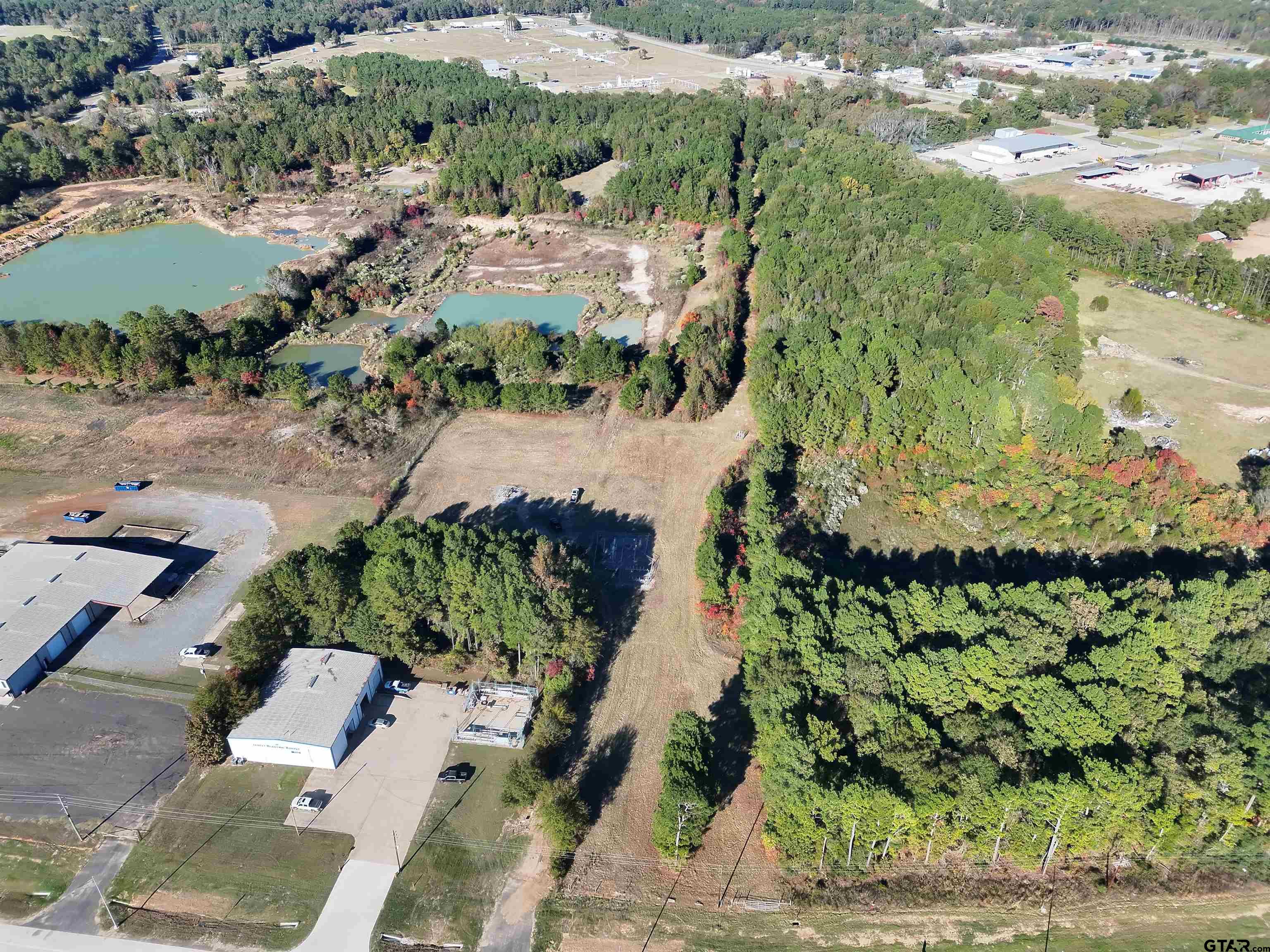0 SW Loop Carthage, TX 75633 - Photo 7 of 18 an aerial view of a house with a yard