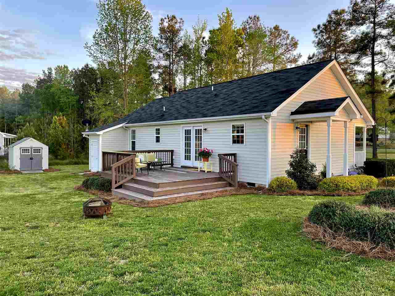 8737 Dukes Lake Road Zebulon, NC 27597 - Photo 5 of 6 Back Entrance and Deck