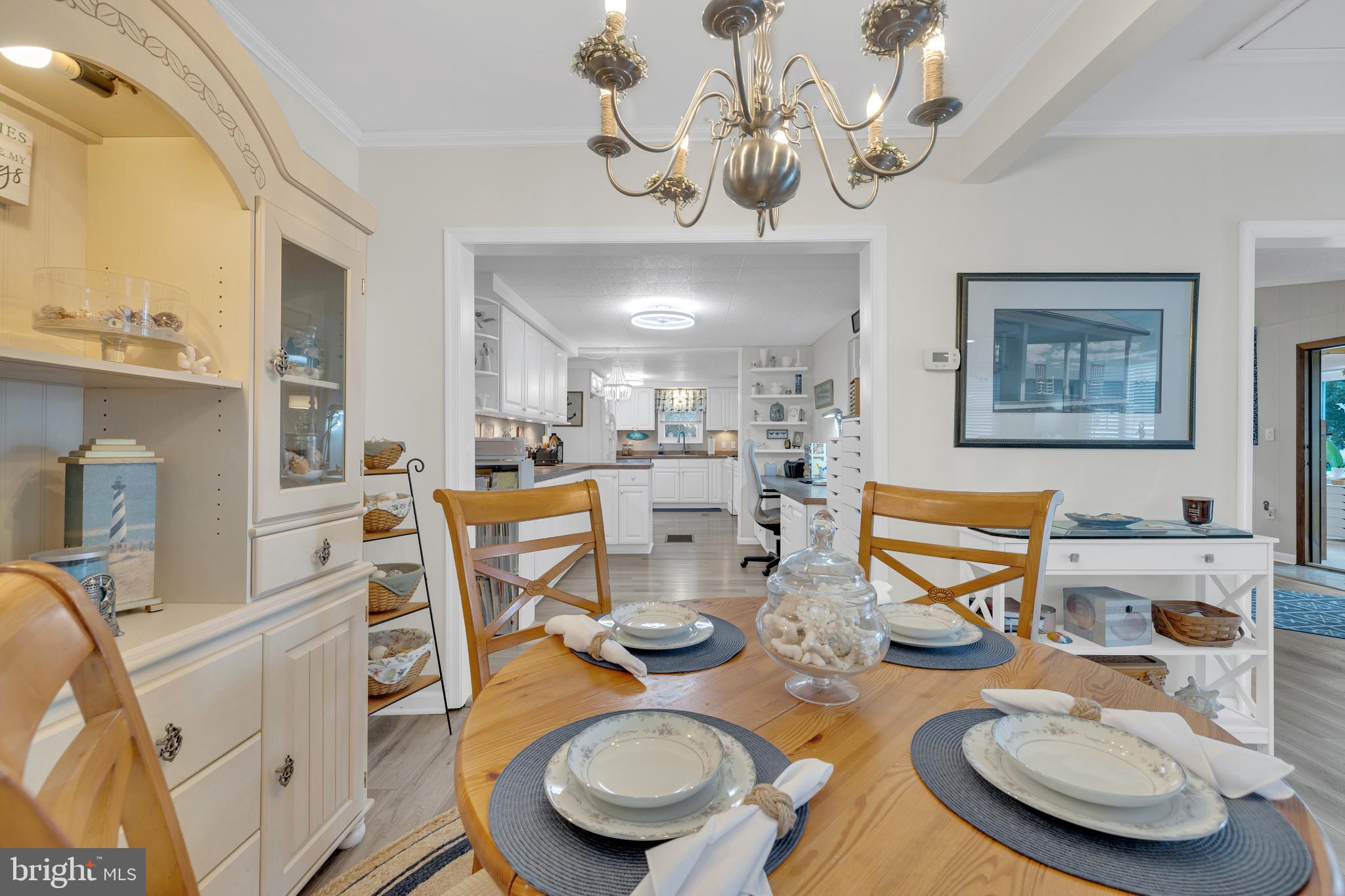 30879 Maplewood Road Ocean View, DE 19970 - Photo 21 of 41 a view of a dining room with furniture