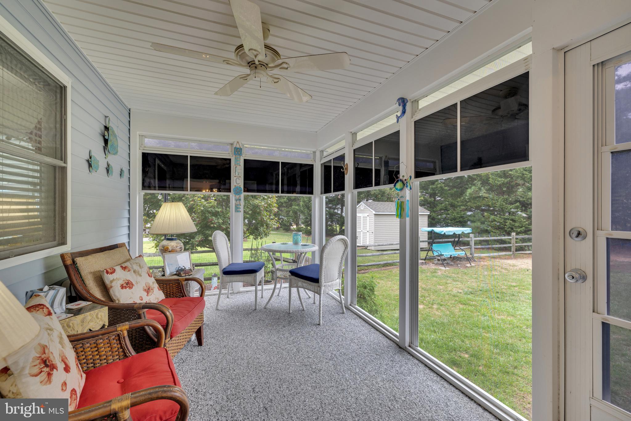 30879 Maplewood Road Ocean View, DE 19970 - Photo 31 of 41 a living room filled with furniture