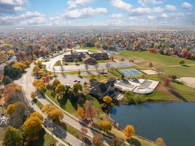 an aerial view of a houses with outdoor space
