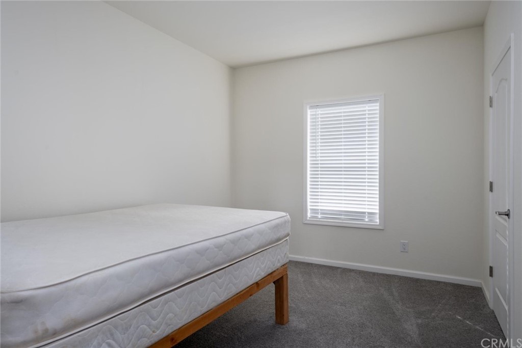 12980 Mohawk Way Concow, CA 95965 - Photo 13 of 26 a room with a bed and a window