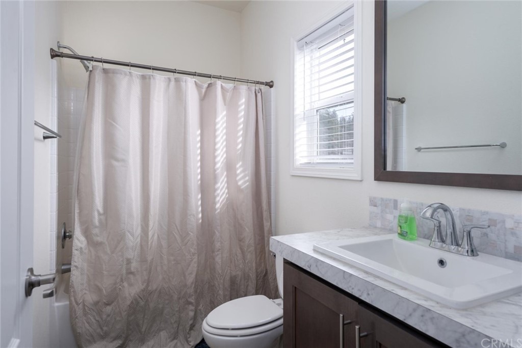 12980 Mohawk Way Concow, CA 95965 - Photo 14 of 26 a bathroom with a granite countertop sink and a mirror