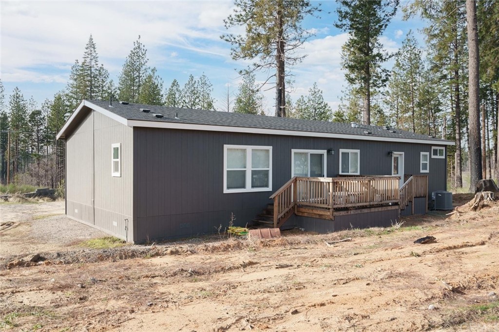 12980 Mohawk Way Concow, CA 95965 - Photo 20 of 26 a front view of a house with a yard covered in snow