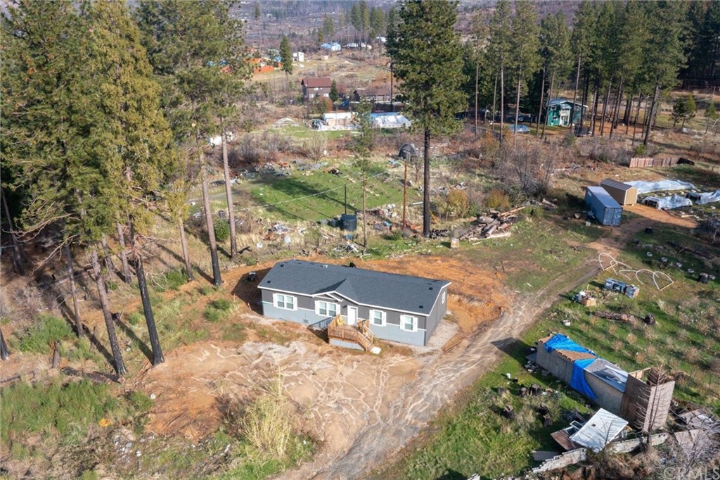 12980 Mohawk Way Concow, CA 95965 - Photo 21 of 26 a backyard of a house with table and chairs