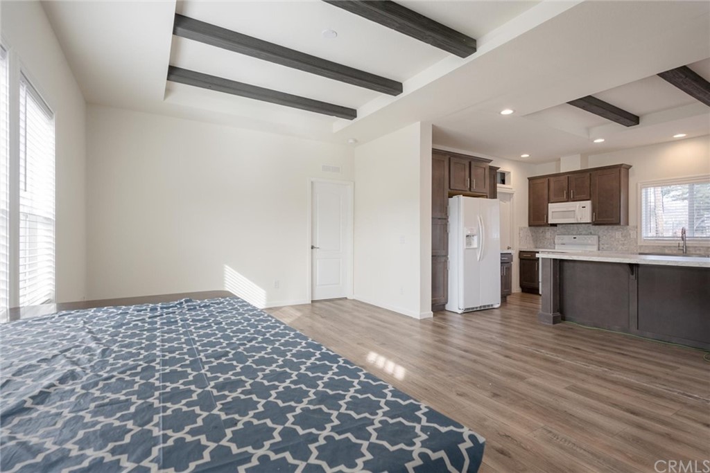 12980 Mohawk Way Concow, CA 95965 - Photo 4 of 26 a view of a kitchen with a sink and a refrigerator
