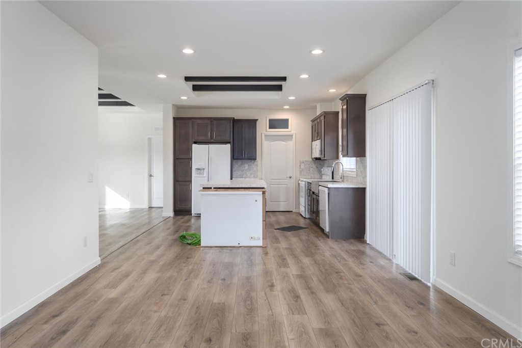 12980 Mohawk Way Concow, CA 95965 - Photo 8 of 26 a kitchen with stainless steel appliances a refrigerator and a stove top oven
