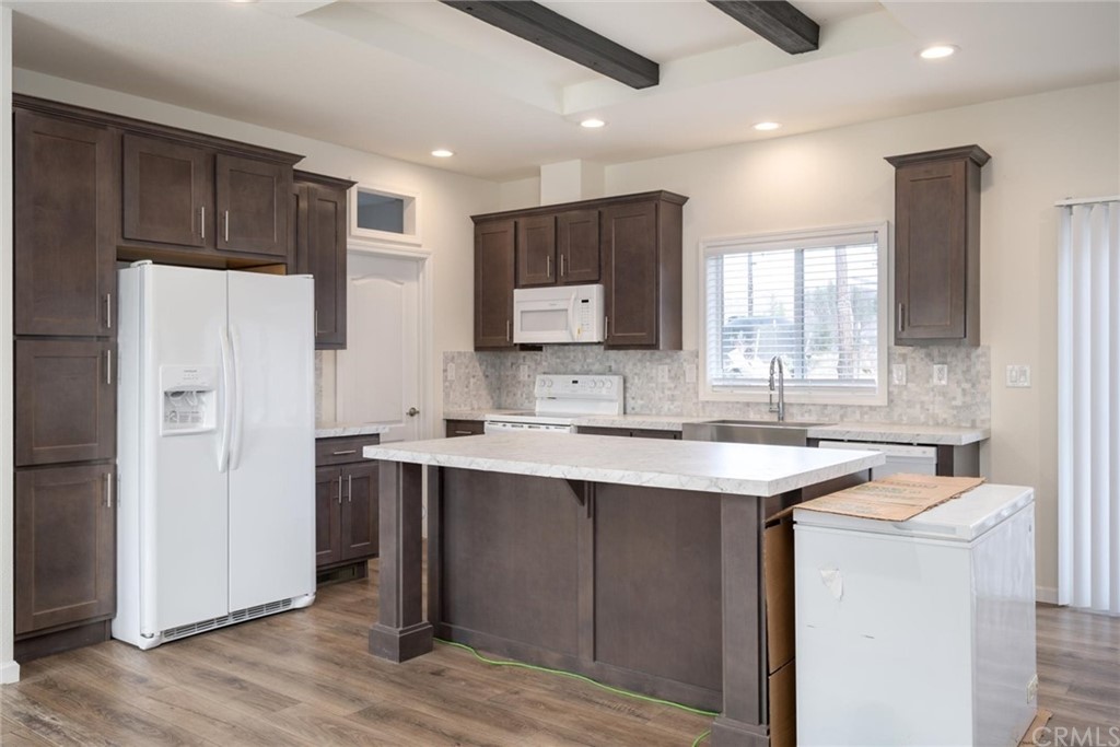 12980 Mohawk Way Concow, CA 95965 - Photo 10 of 26 a kitchen with stainless steel appliances a sink stove and refrigerator