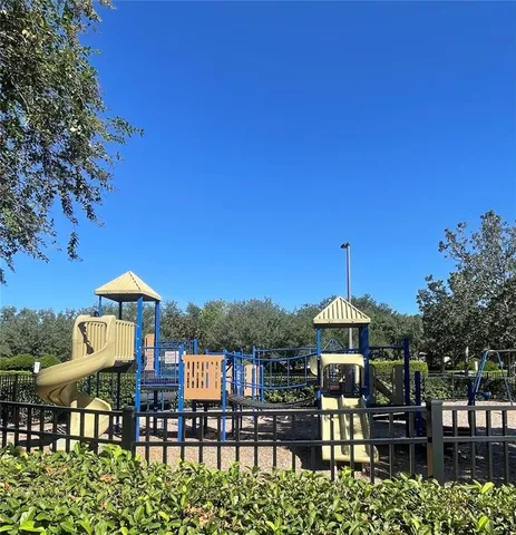 a view of a chairs and table in the patio