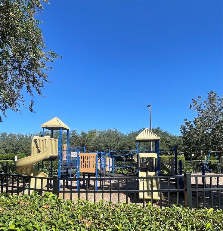 3921 Southwest 58th Avenue Ocala, FL 34474 - Photo 25 of 31 a view of a chairs and table in the patio