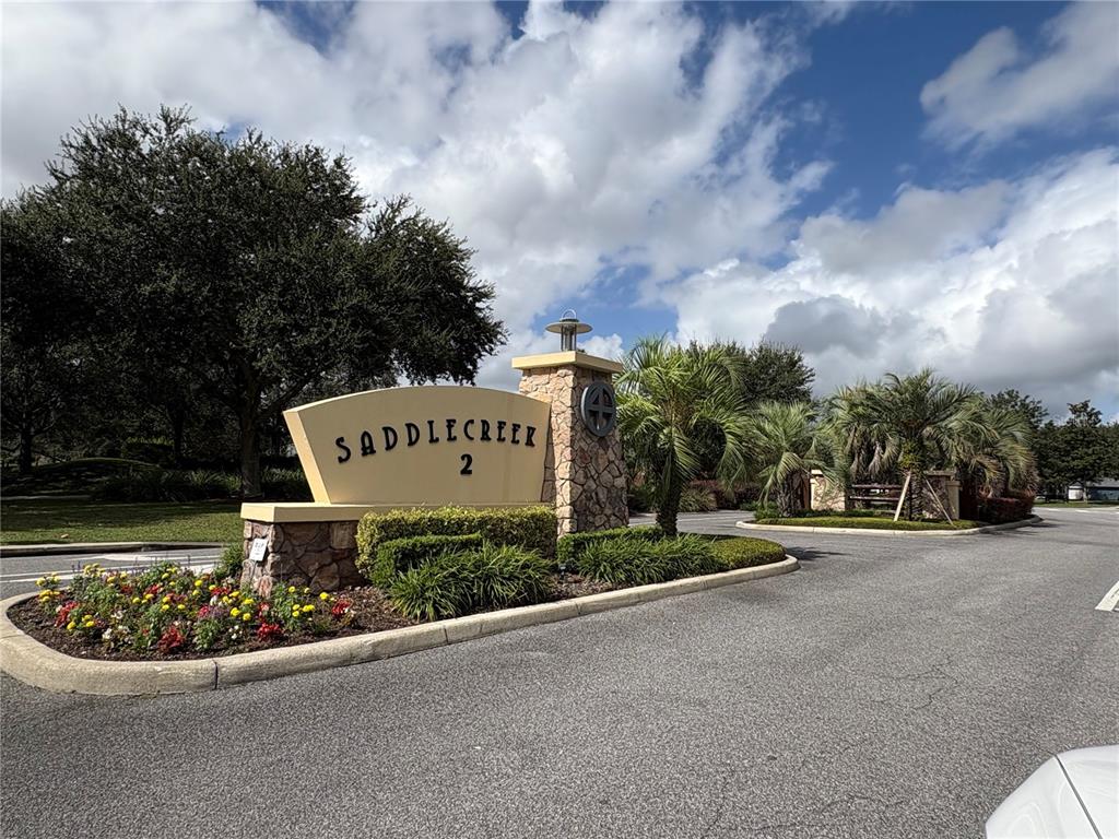 3921 Southwest 58th Avenue Ocala, FL 34474 - Photo 7 of 31 a sign on the side of the road