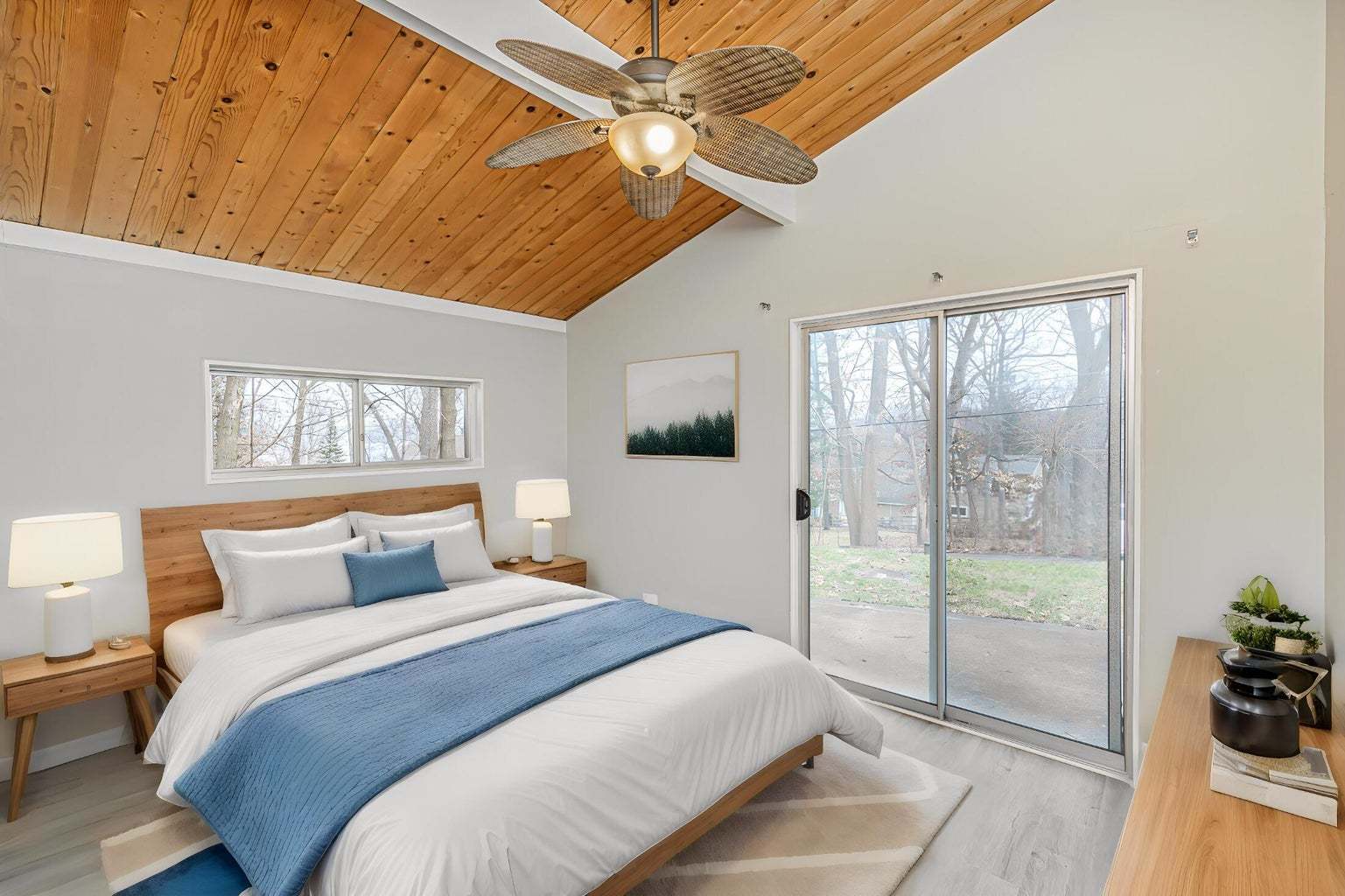 N1801 Birch Drive Linn, WI 53147 - Photo 15 of 33 a bedroom with a bed and a chandelier