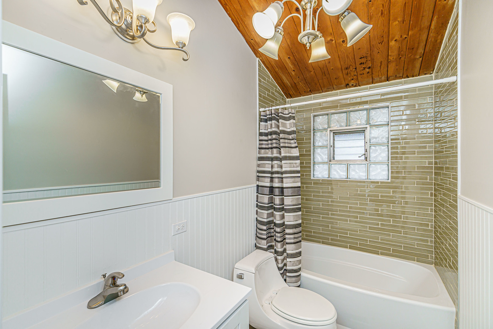 N1801 Birch Drive Linn, WI 53147 - Photo 17 of 33 a bathroom with a sink a toilet and shower