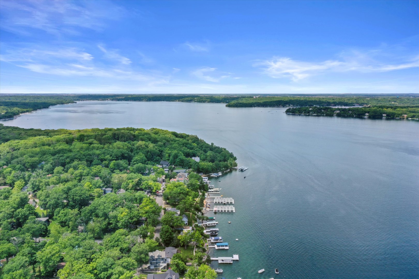 N1801 Birch Drive Linn, WI 53147 - Photo 26 of 33 a view of a lake with a city