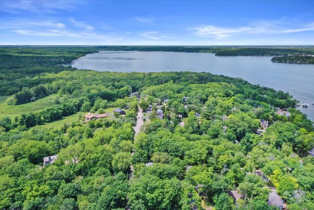 a view of a lake with a yard