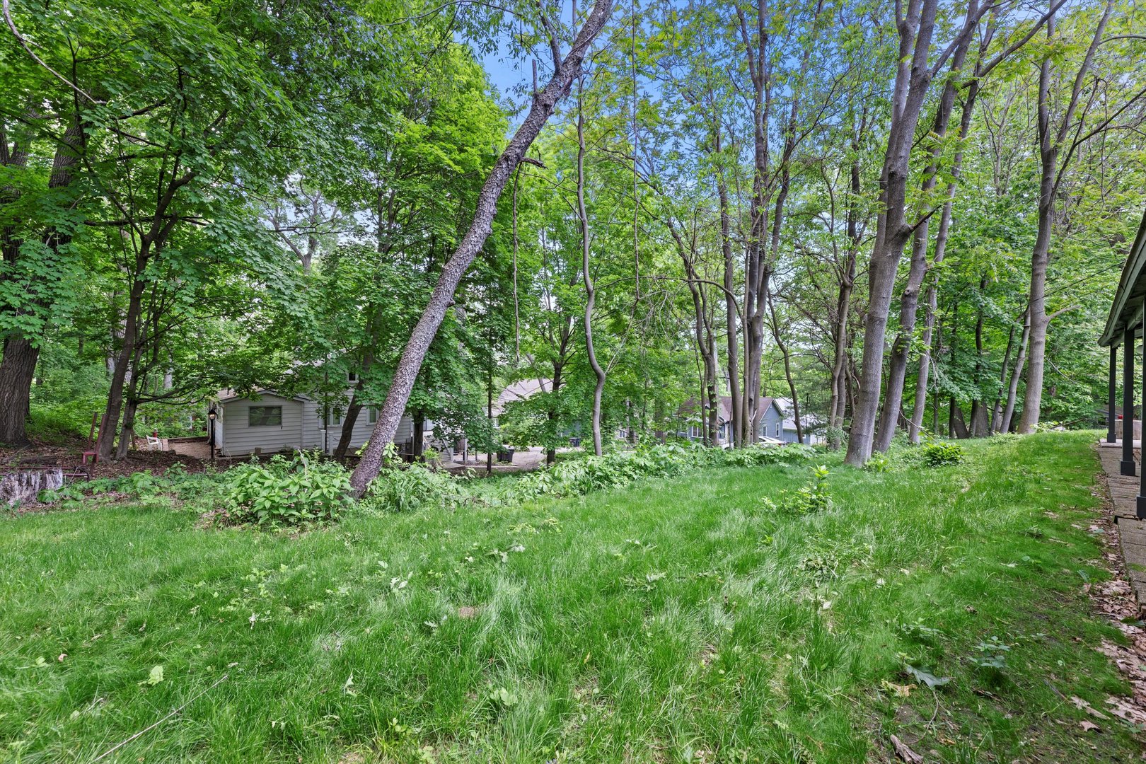 N1801 Birch Drive Linn, WI 53147 - Photo 30 of 33 a view of backyard with a barn and large trees