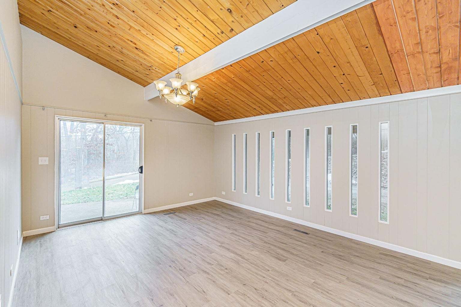 N1801 Birch Drive Linn, WI 53147 - Photo 5 of 33 a view of an empty room with wooden floor