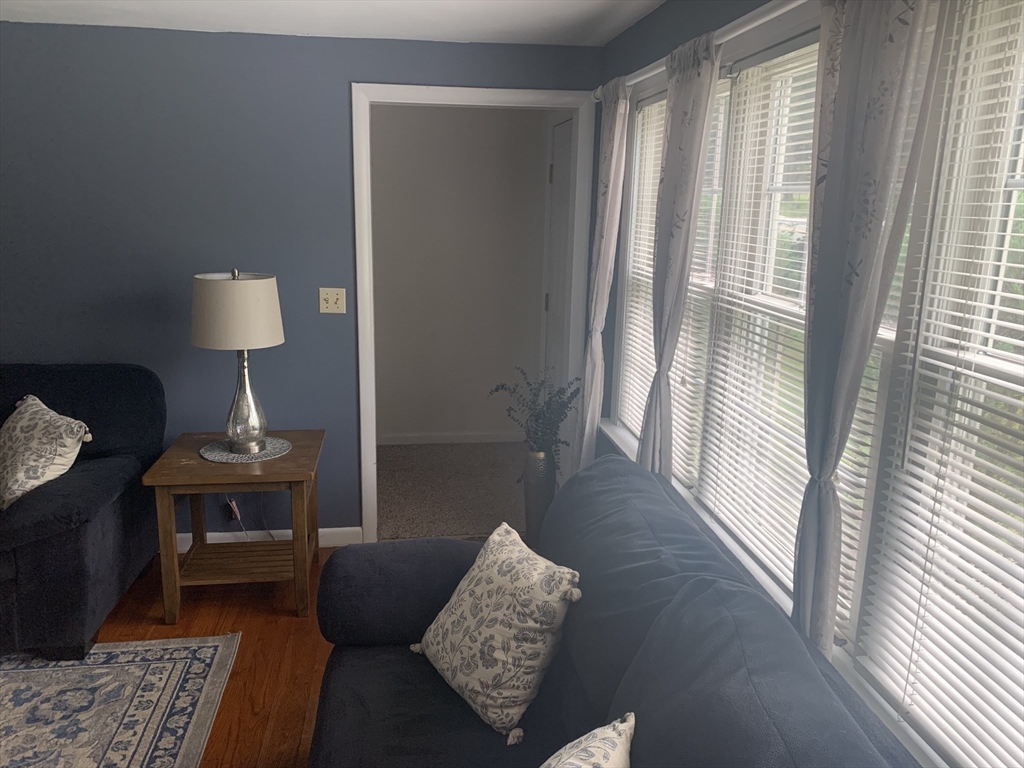 172 Maple Street East Longmeadow, MA 01028 - Photo 11 of 35 a living room with furniture and a window