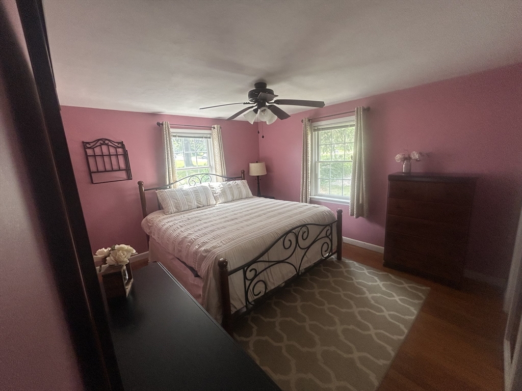 172 Maple Street East Longmeadow, MA 01028 - Photo 18 of 35 a bedroom with a bed and a mirror