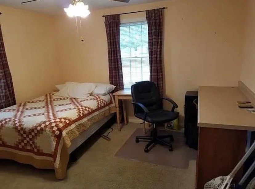 172 Maple Street East Longmeadow, MA 01028 - Photo 21 of 35 a bed sitting in a bedroom next to a window