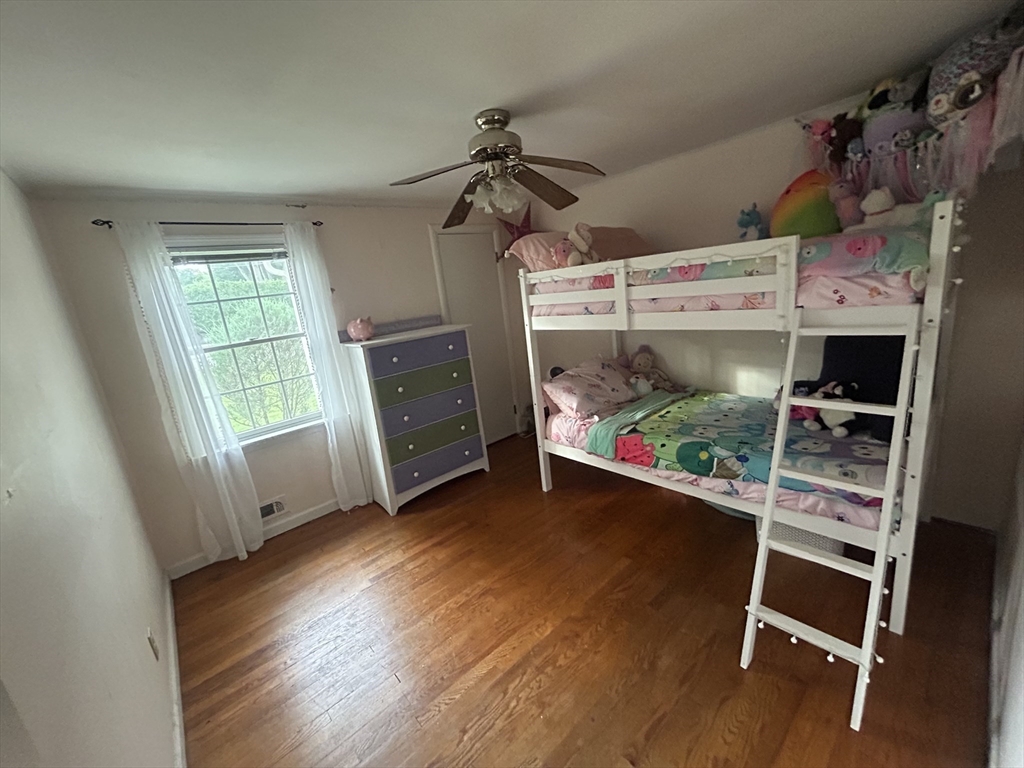 172 Maple Street East Longmeadow, MA 01028 - Photo 22 of 35 a room with wooden floor and window