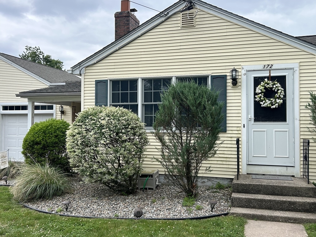 172 Maple Street East Longmeadow, MA 01028 - Photo 3 of 35 a front view of a house with a yard