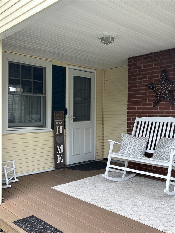 172 Maple Street East Longmeadow, MA 01028 - Photo 6 of 35 a wooden bench sitting in front of a building