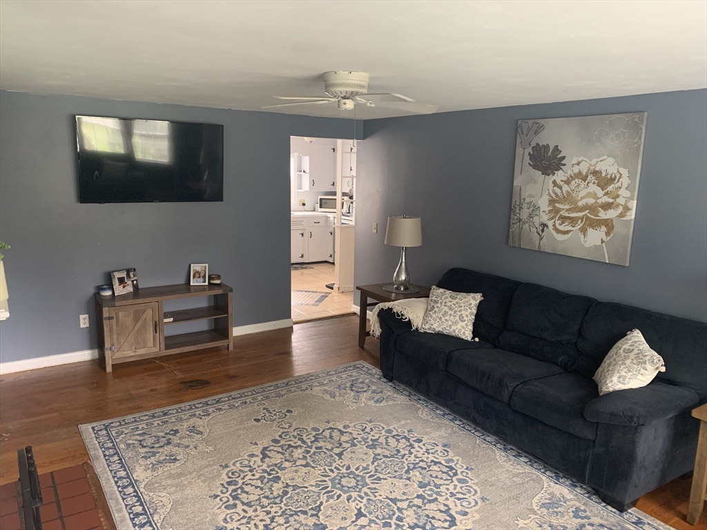 172 Maple Street East Longmeadow, MA 01028 - Photo 8 of 35 a living room with furniture and a flat screen tv