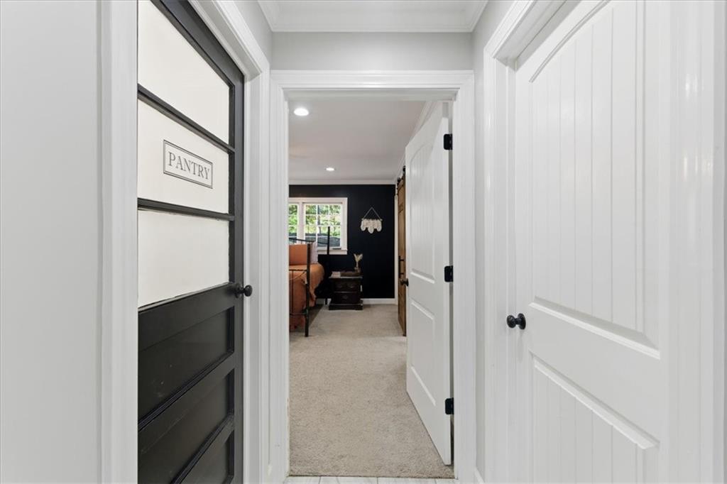 7 Thrushwood Road Northeast Rome, GA 30161 - Photo 11 of 37 a view of a hallway with wooden shelves