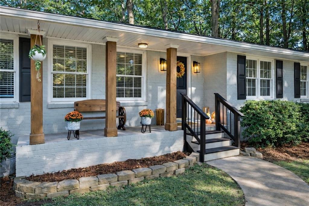 7 Thrushwood Road Northeast Rome, GA 30161 - Photo 2 of 37 a backyard of a house with outdoor seating