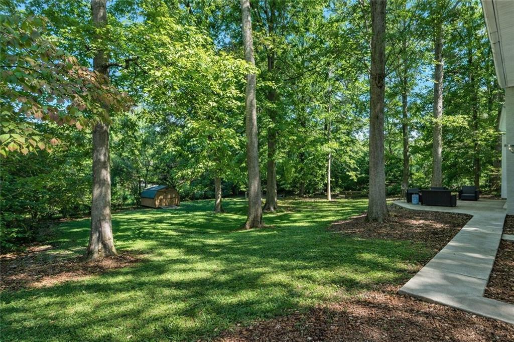 7 Thrushwood Road Northeast Rome, GA 30161 - Photo 35 of 37 a view of a park with a tree