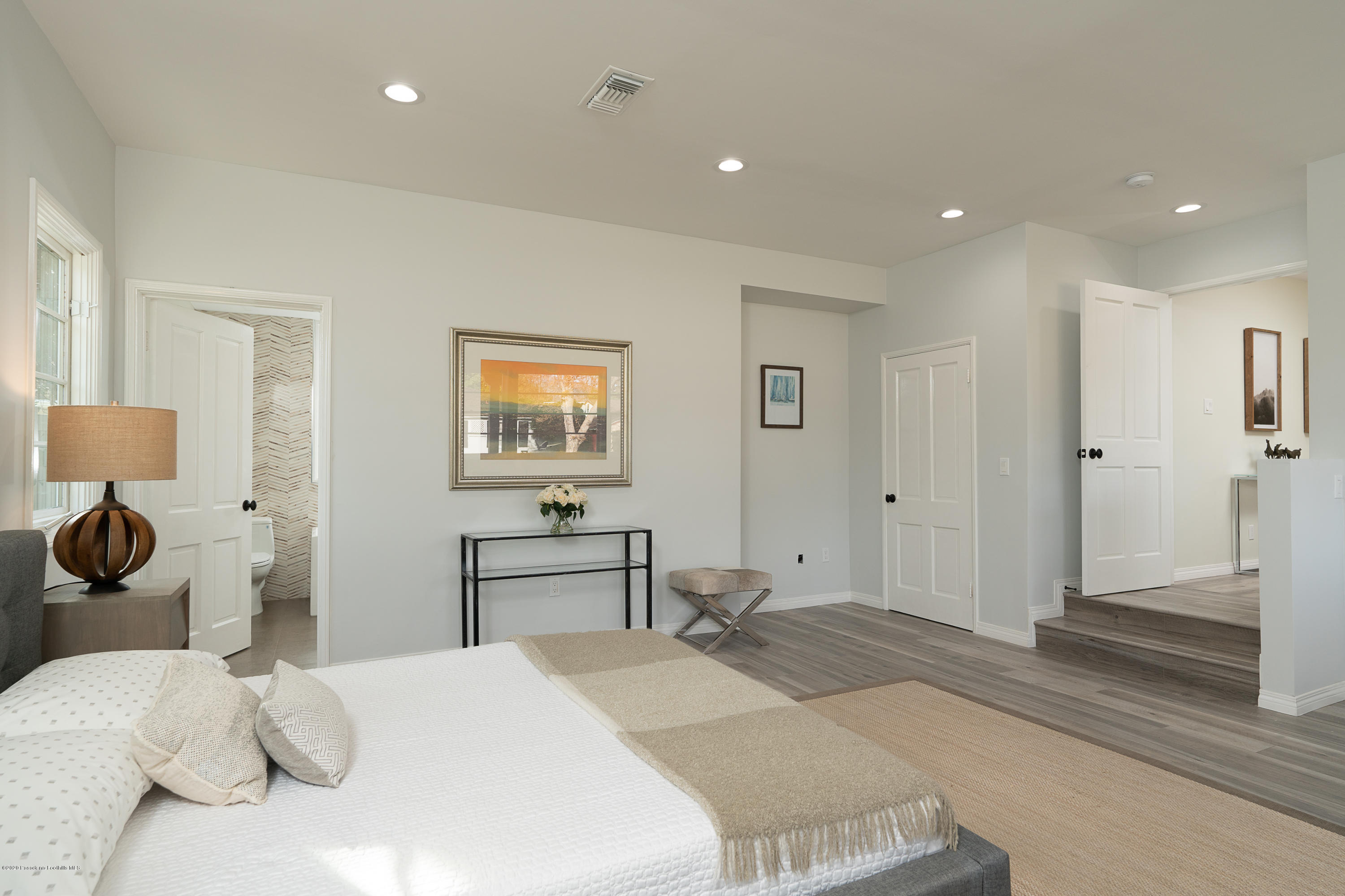 3248 George Circle Pasadena, CA 91107 - Photo 11 of 34 a bedroom with a bed and wooden floor