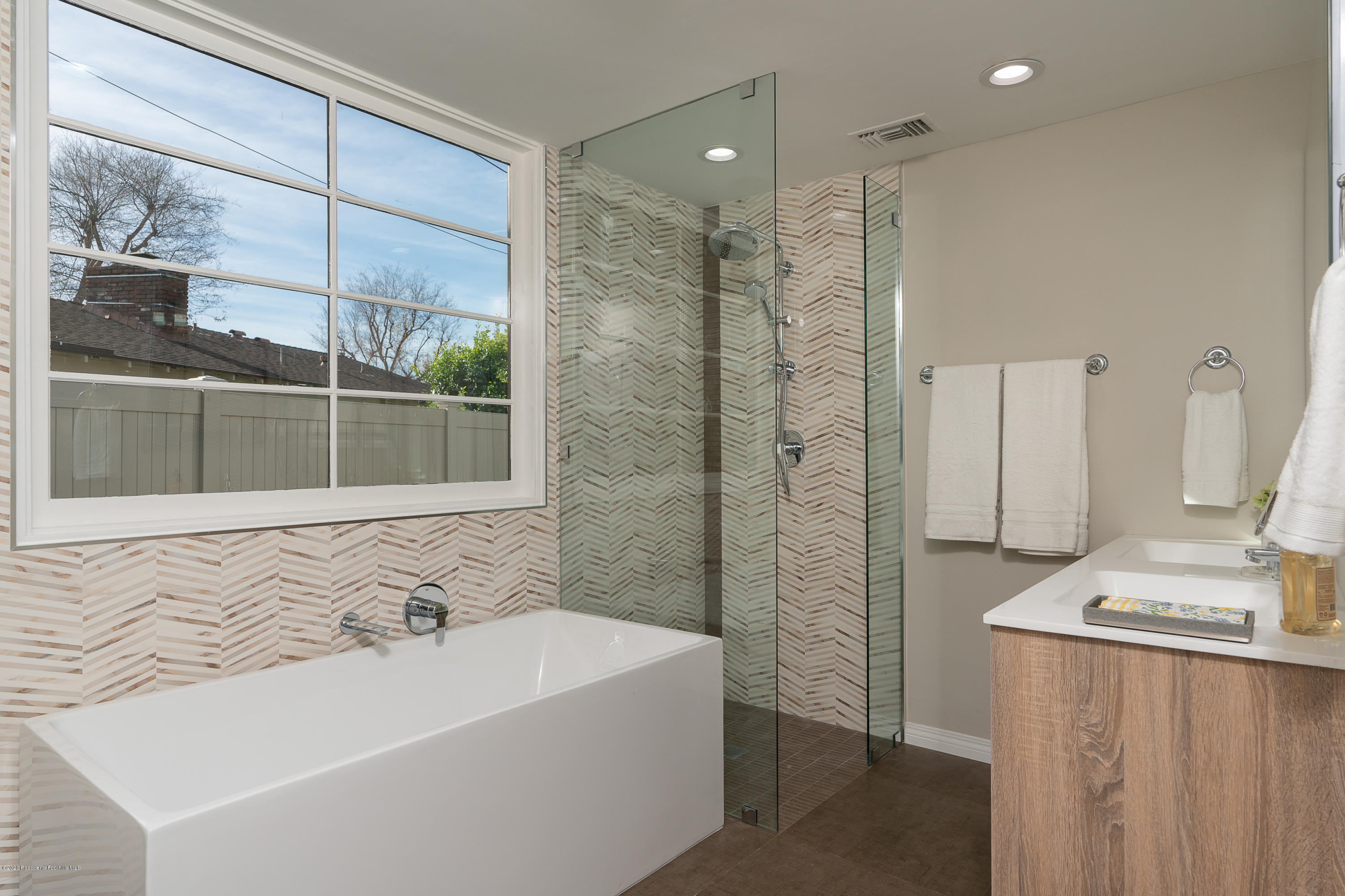 3248 George Circle Pasadena, CA 91107 - Photo 12 of 34 a bathroom with a bathtub and a sink